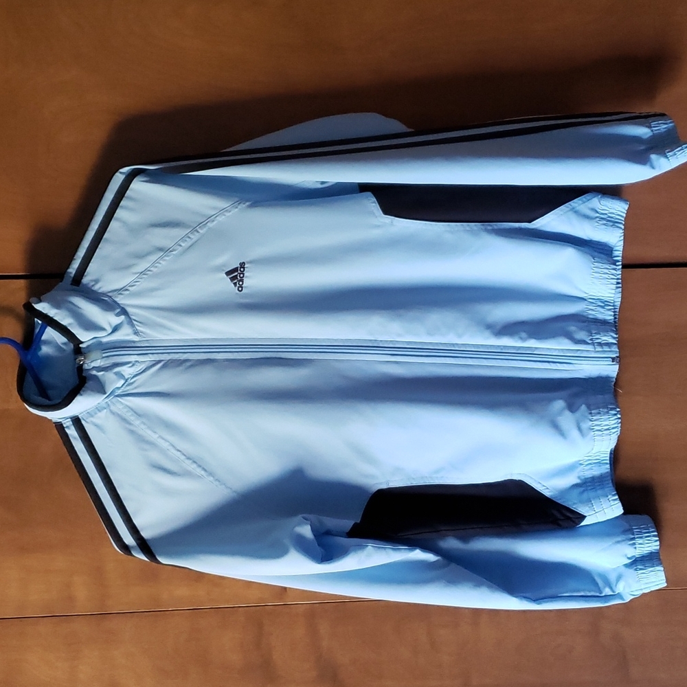 Baby blue and black Adidas nylon zip up jacket.